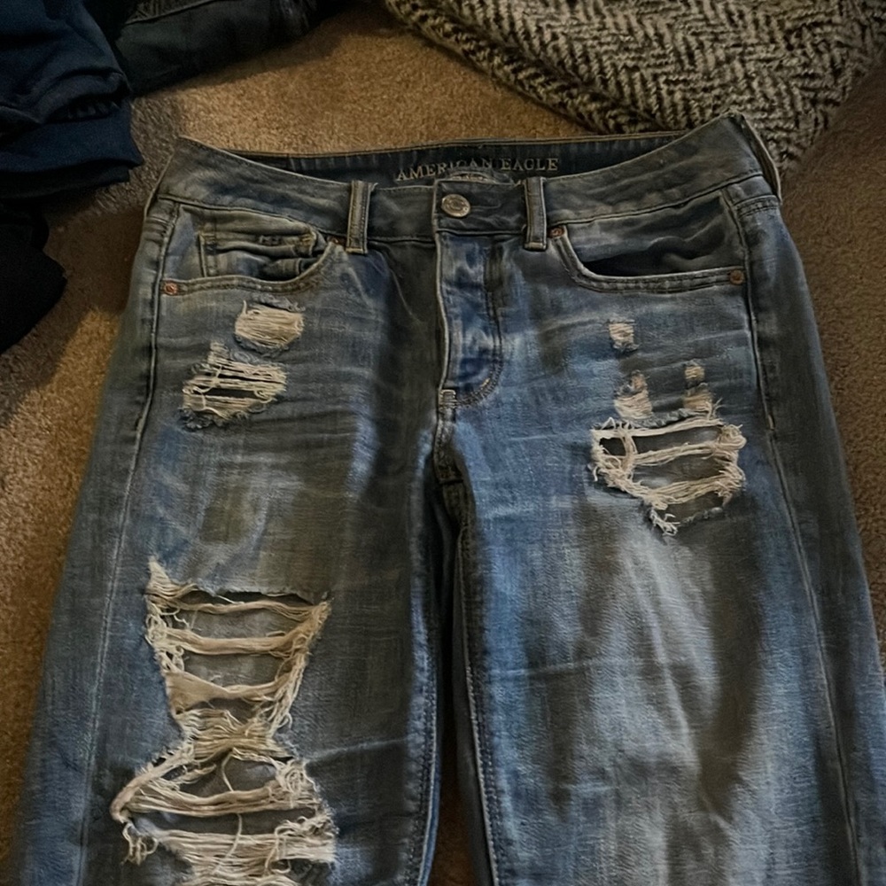 Ripped, blue-denim jeans